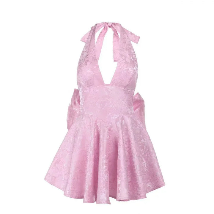 Pink mini A-line halter dress cutout with tie bow and flared skirt