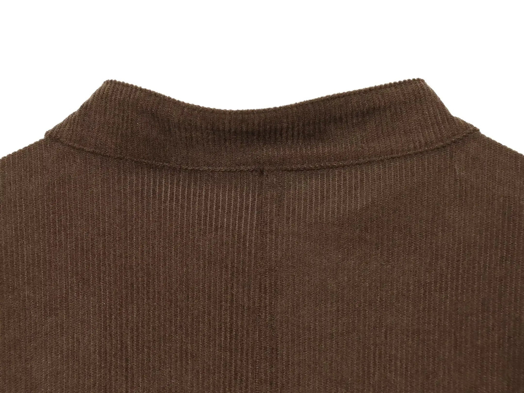 Brown cropped coat with high stand collar and textured knit-like fabric