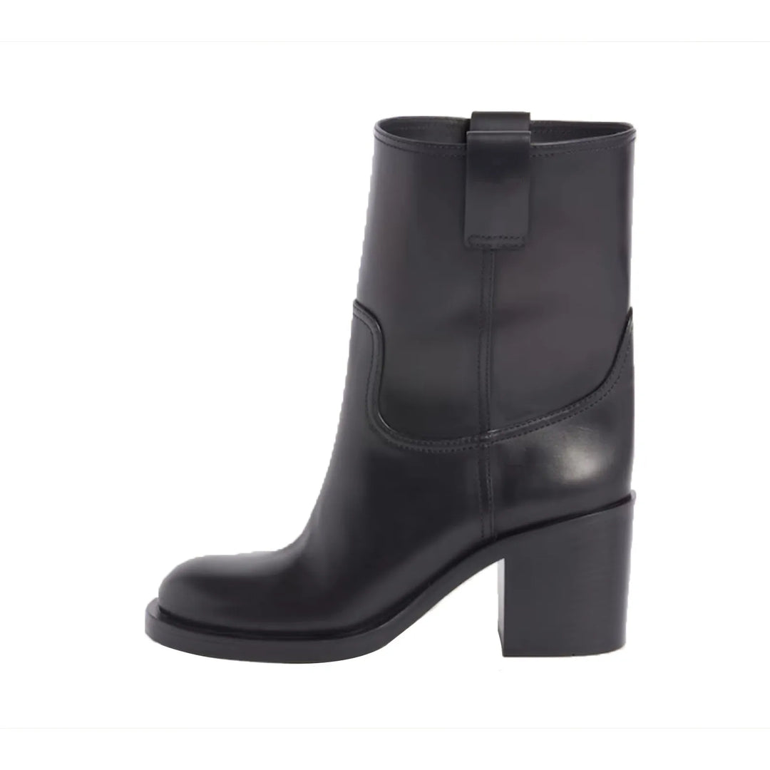 Black ankle boots with round toe, pull-on fit, and chunky block heel