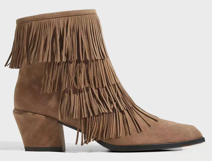 Taupe suede women’s tassel ankle boots, side profile with block heel and long fringe