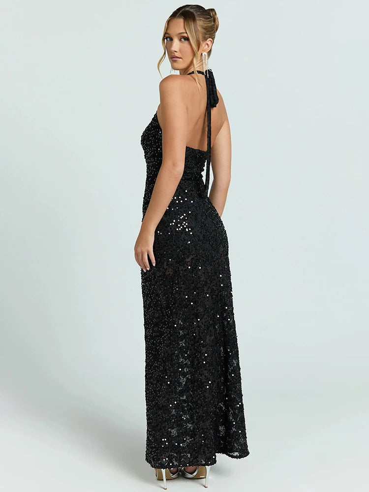 Black sequin bodycon gown with 3D floral texture, open back, spaghetti straps