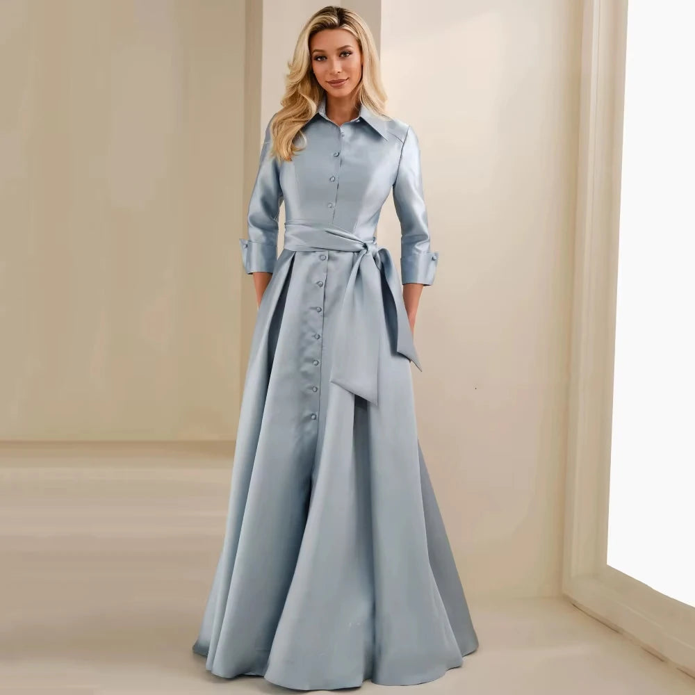 Women's chiffon bride gown in light blue, button-front, belted waist, long A-line skirt