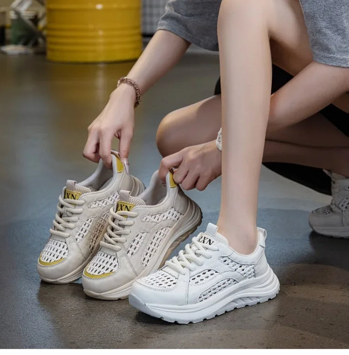 Light beige woven mesh lace-up sneakers with yellow collar accents and chunky sole.