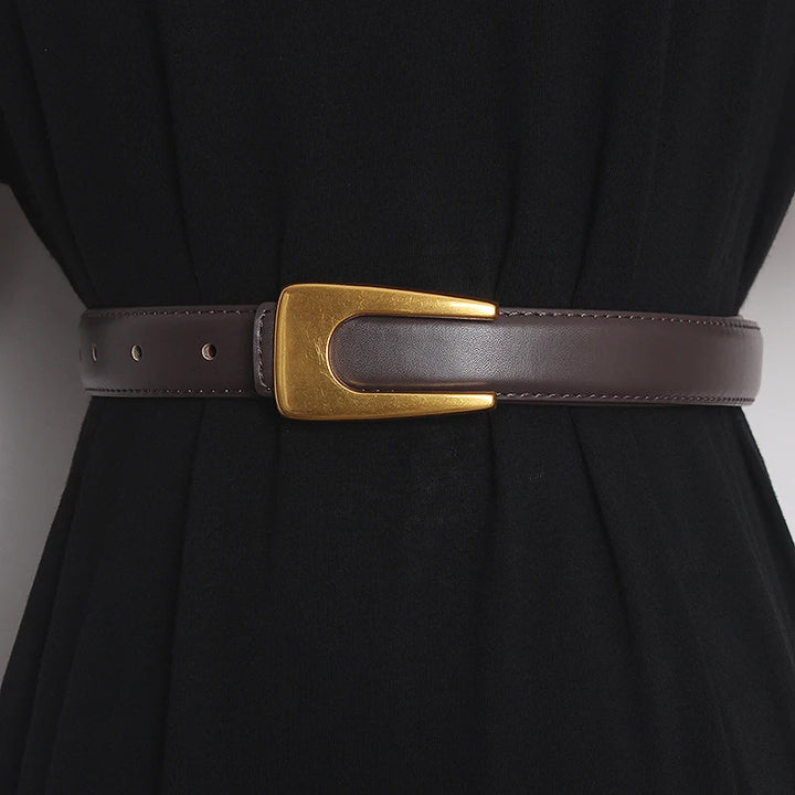 Narrow dark brown leather waist belt with gold-tone rectangular buckle and adjustment holes