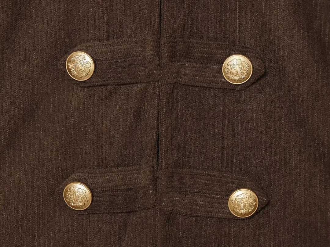 Close-up of brown coat front with gold decorative buttons and buttoned flap details