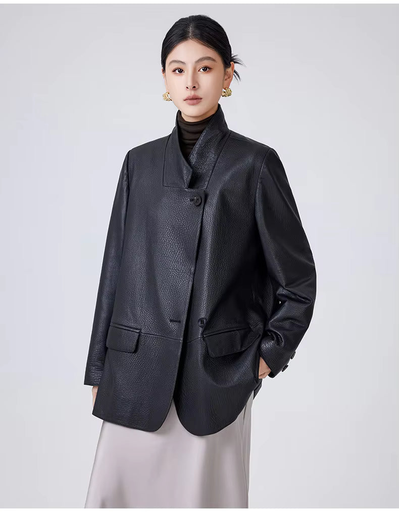 Black real leather blazer with button front, structured shoulders, long sleeves