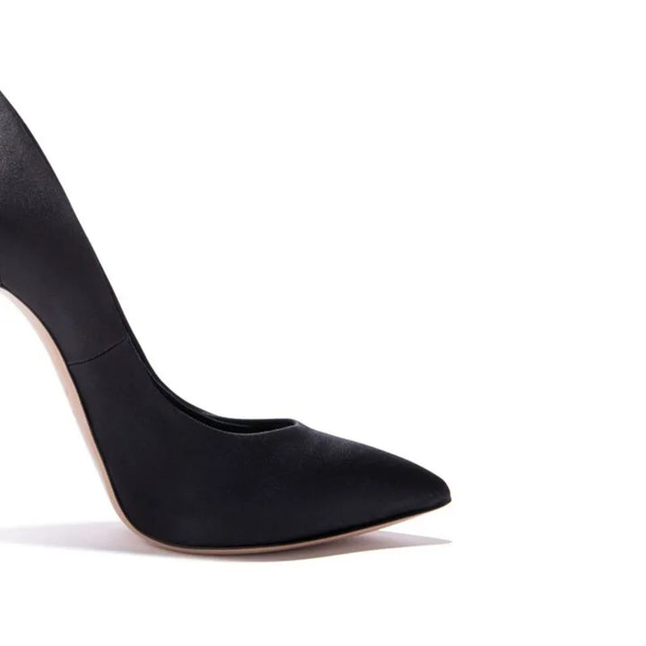 Close-up of black pointed-toe slip-on pump with tall stiletto heel