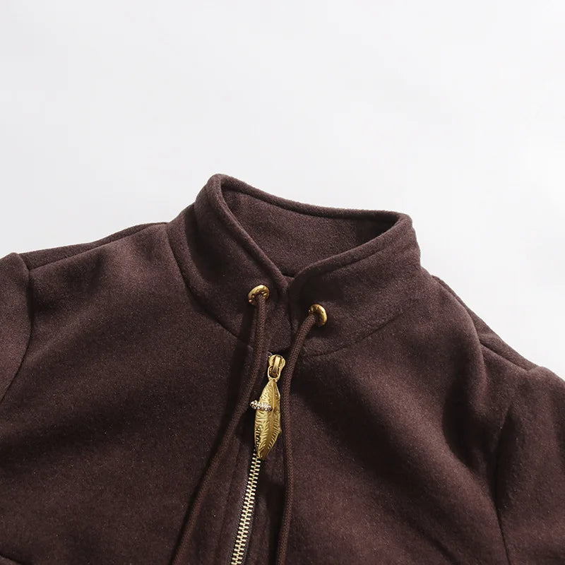 Coffee brown jacket collar and zipper, gold pull tabs and drawcord ends