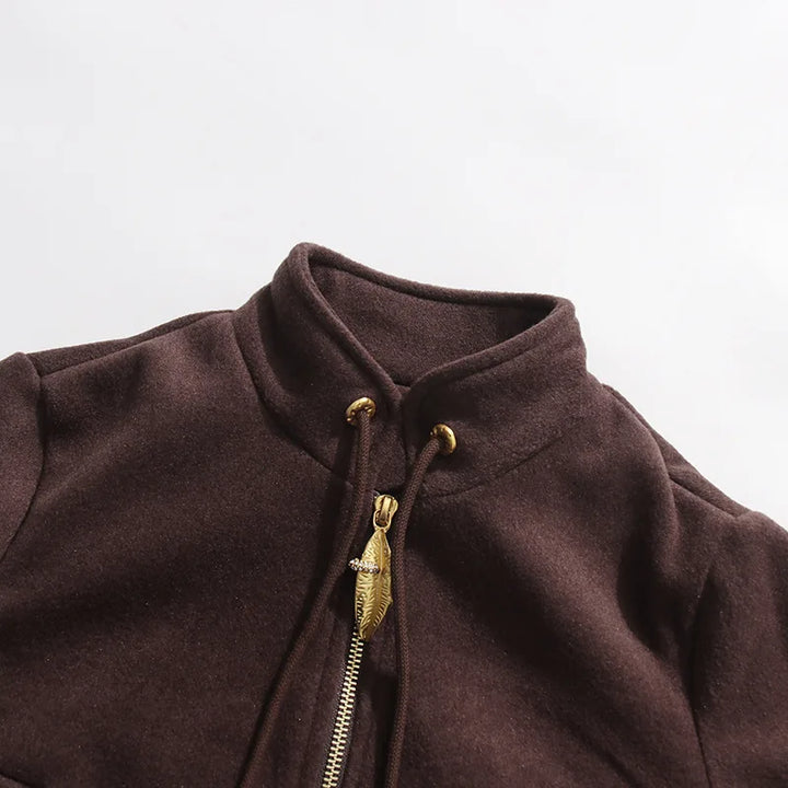 Coffee brown jacket collar and zipper, gold pull tabs and drawcord ends