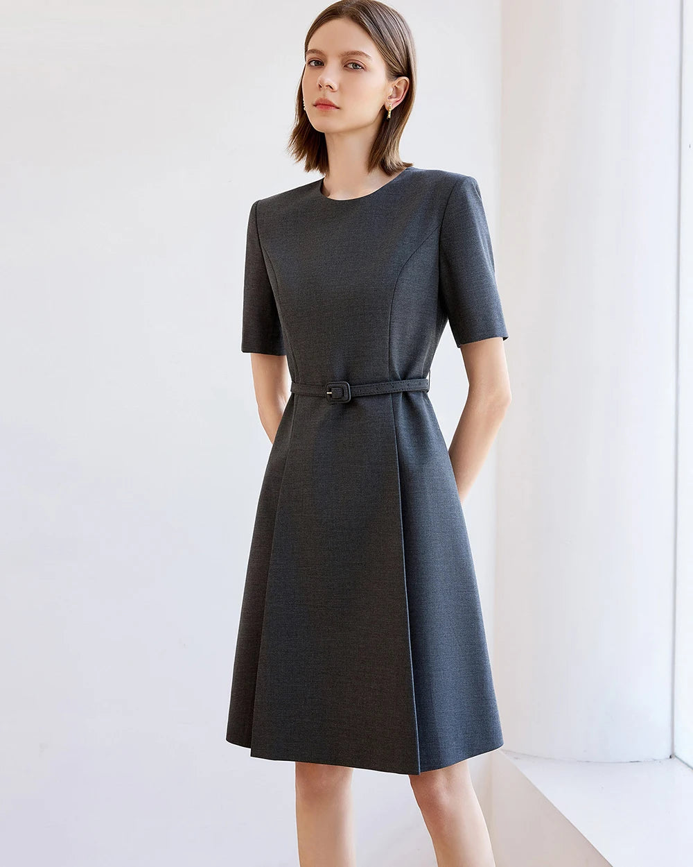 Dark grey A-line office dress with waist tie belt, short sleeves and crew neckline