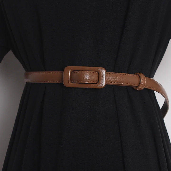 Camel brown narrow leather belt with rectangular buckle and stitched strap