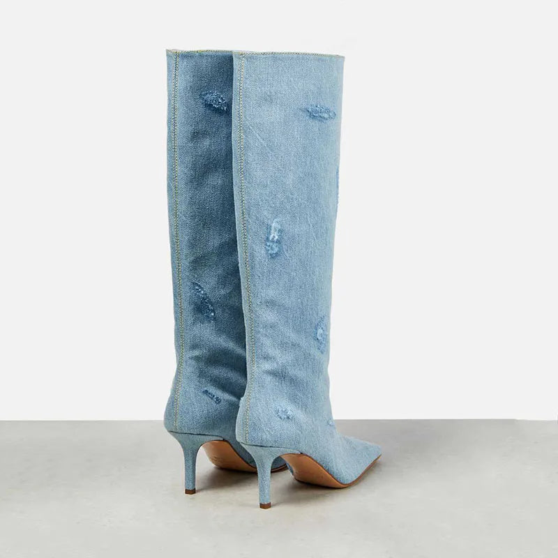 Light blue women's knee-high boots with denim look, pointed toe, and stiletto heel