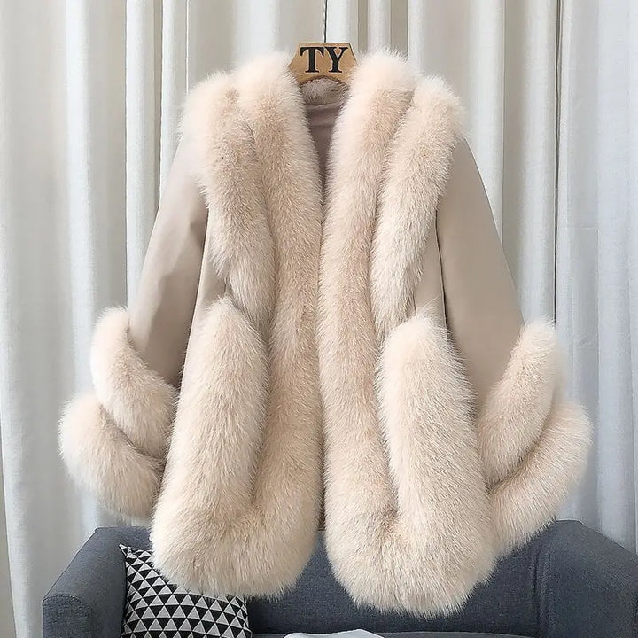 Women’s fur-trimmed leather jacket with cream long-haired sleeves and front panels