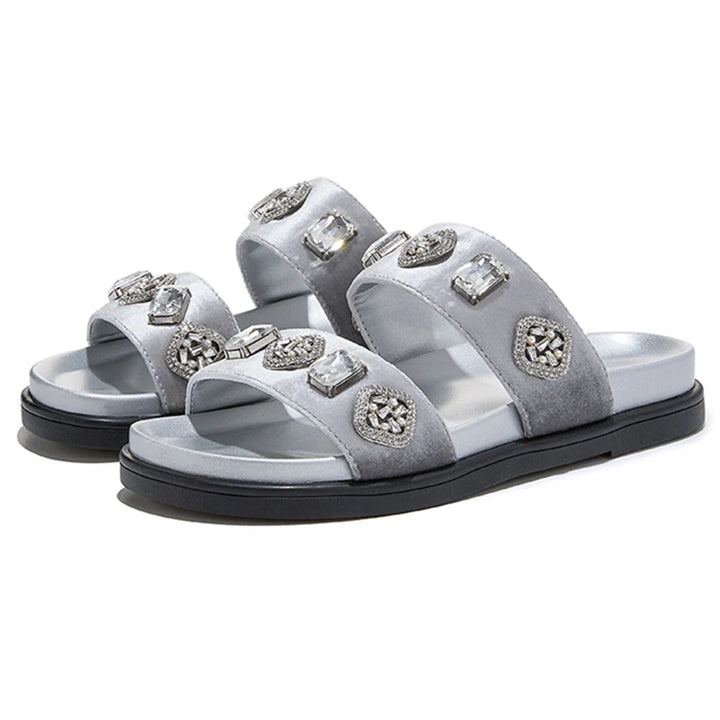 Gray flat slide slippers with jeweled straps and round rhinestone medallion buckles