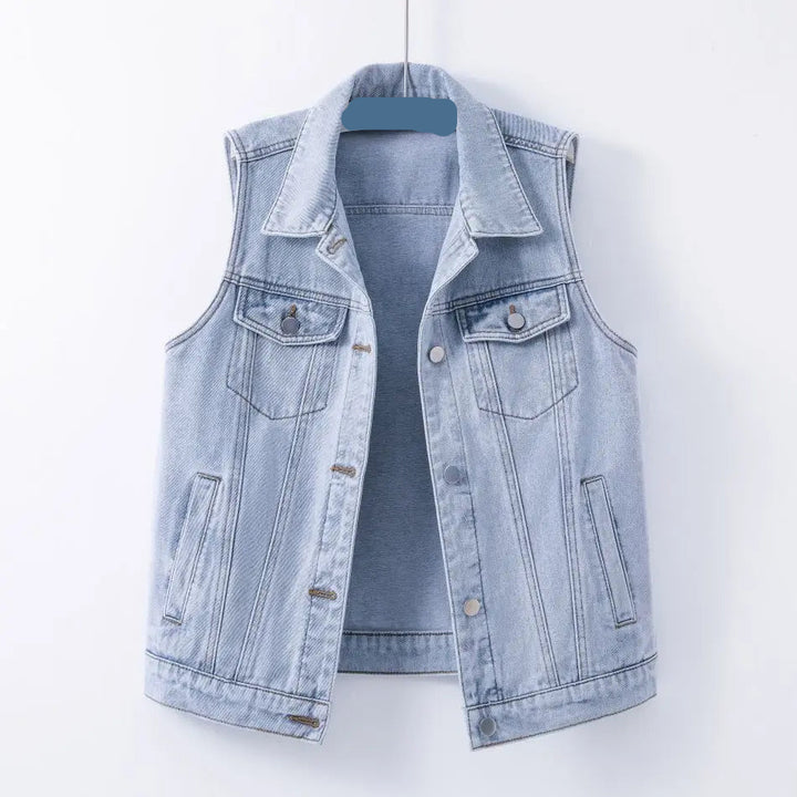 Light blue denim vest on a white background