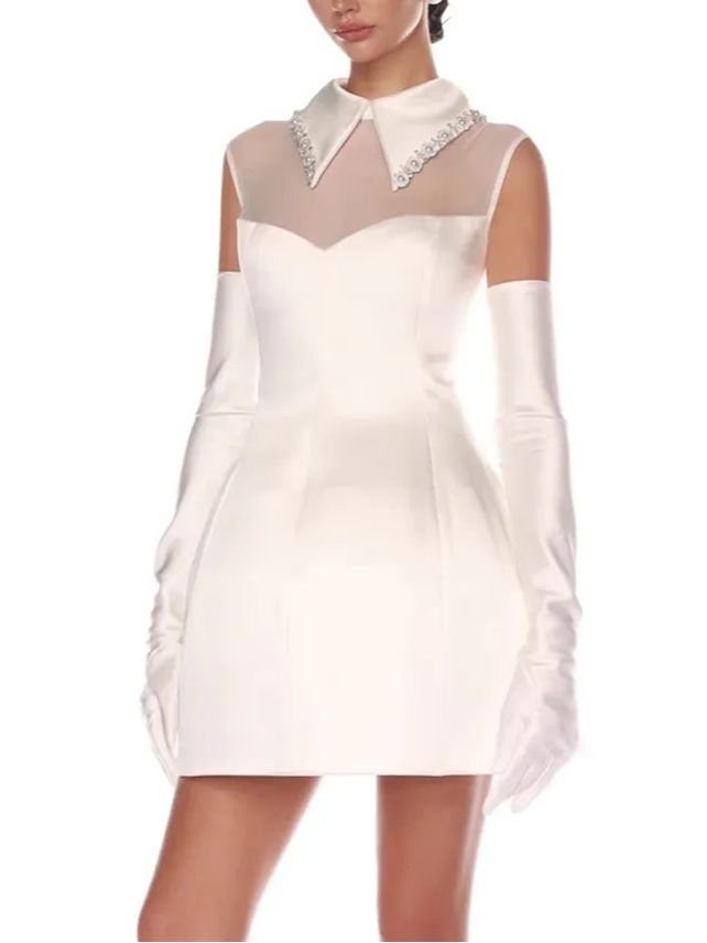 White dress with sheer sleeves and collar on a white background