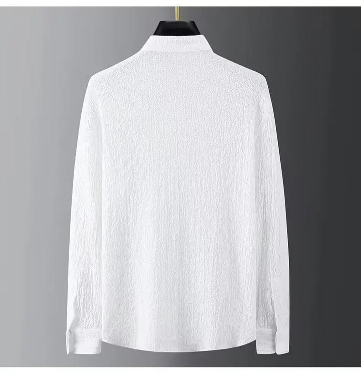 White men’s button-up shirt from back view, long sleeves