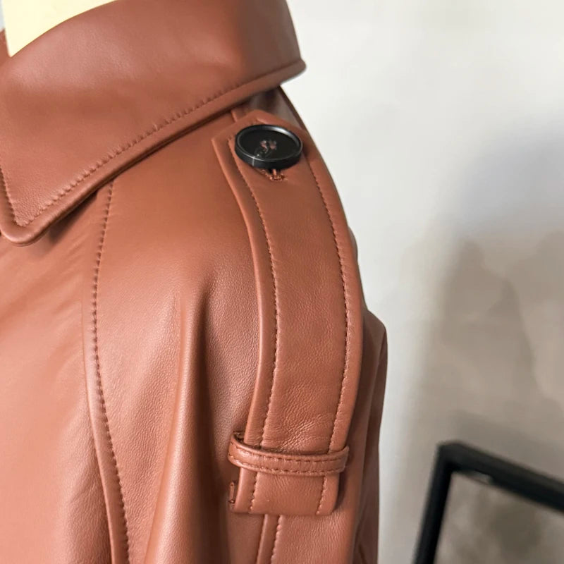 Women’s leather coat shoulder seam and epaulet with button, caramel-brown