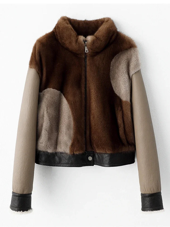Women’s short mink fur jacket, front view, brown and tan patch panels with zip closure