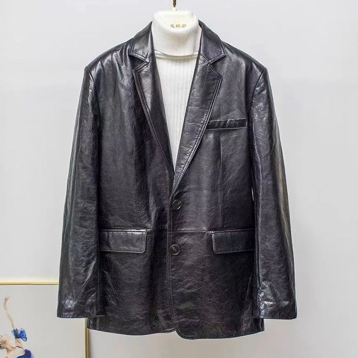 Women’s black leather blazer-style jacket, button front, flap pockets, notch collar