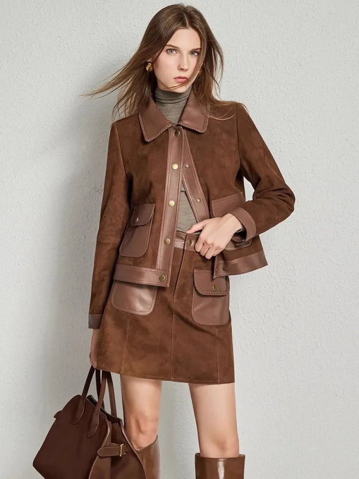 Brown suede lapel jacket with snap front, patch pockets, and waist belt strap.