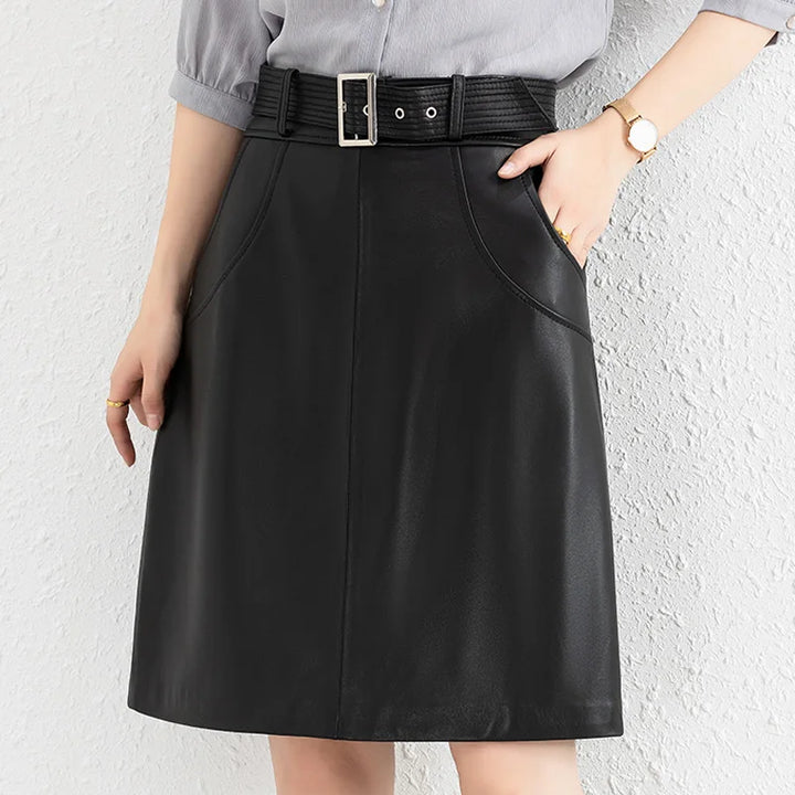 Black leather midi skirt with belt loops and front vertical seam details