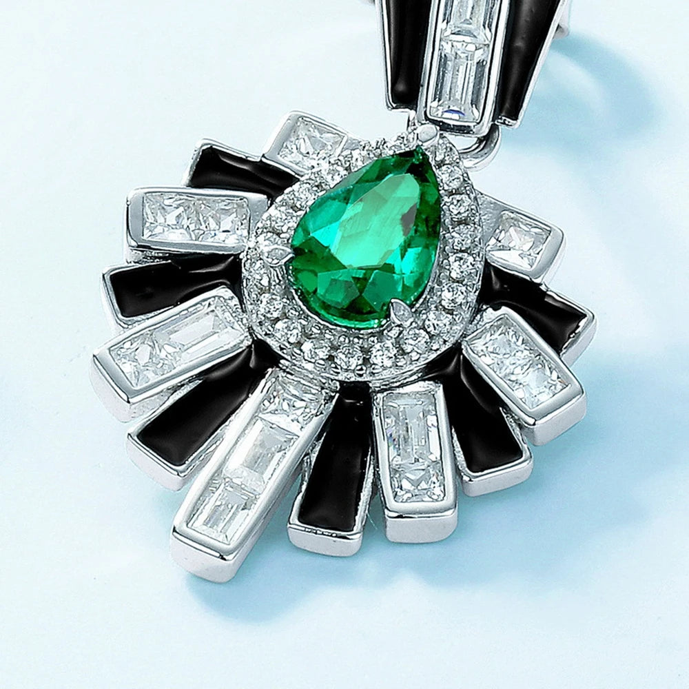 Exquisite Pear Cut Emerald Earring