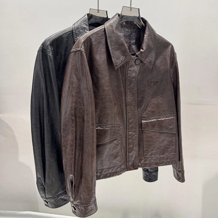 Women’s distressed leather jacket, notch lapel, front zipper, chest pockets