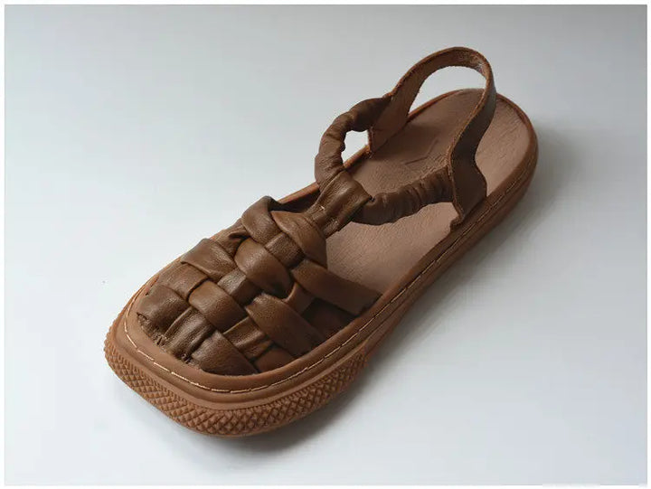 Coffee brown woven leather slip-on casual shoe, single pair showing braided strap detail