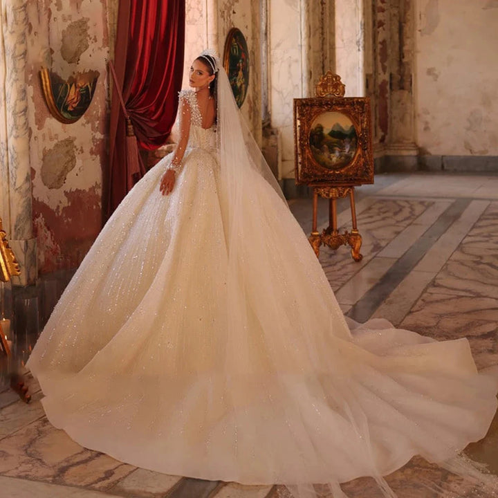 Robe de mariée élégante à manches longues et paillettes