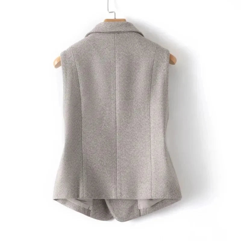 Women's padded waistcoat back view, sleeveless gray herringbone with center seams