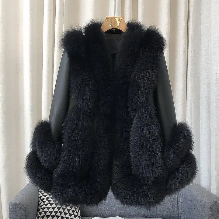 Women’s warm fur jacket, black with open front, long sleeves, and fluffy fur cuffs