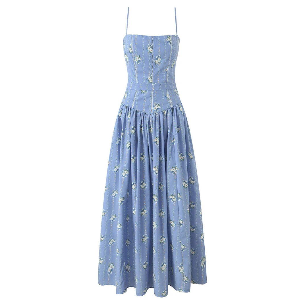 Blue daisy-print midi sundress with thin spaghetti straps and fitted bodice