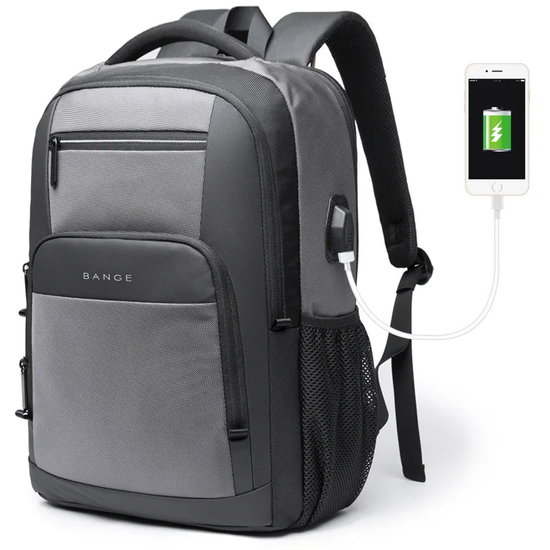 Grey waterproof travel backpack with USB charging cable and front zip pockets