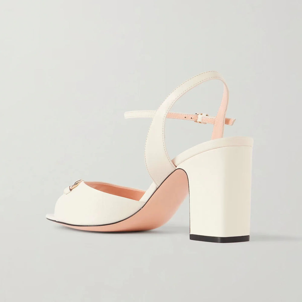 White women's chunky-heel slingback sandals with T-strap and bow detail