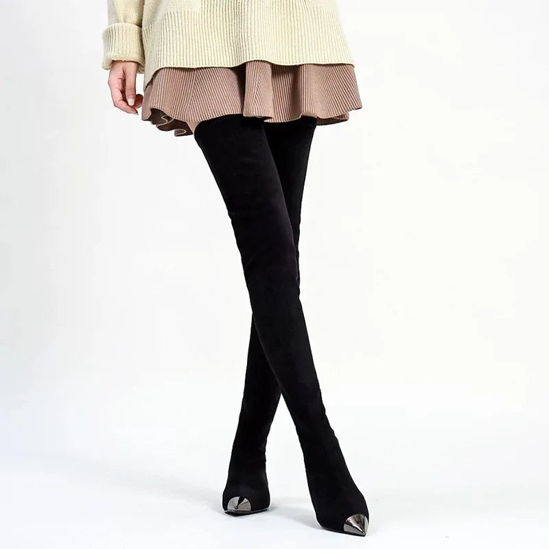 Women’s thigh-high faux suede boots on model, black pointed toe