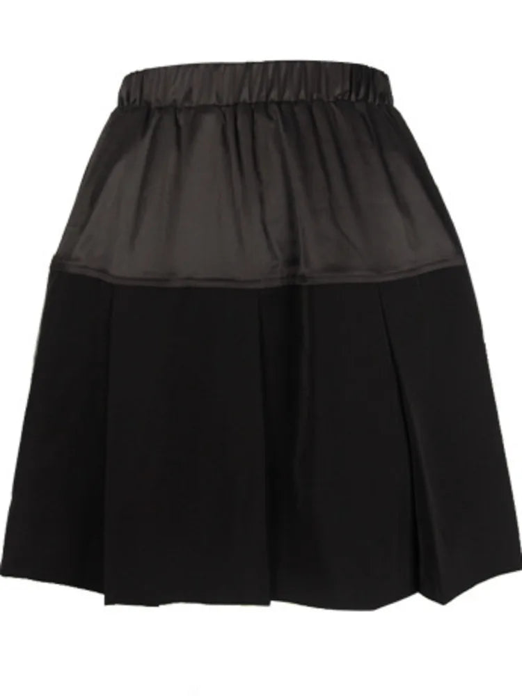 Black pleated cropped skirt with wide elastic waistband