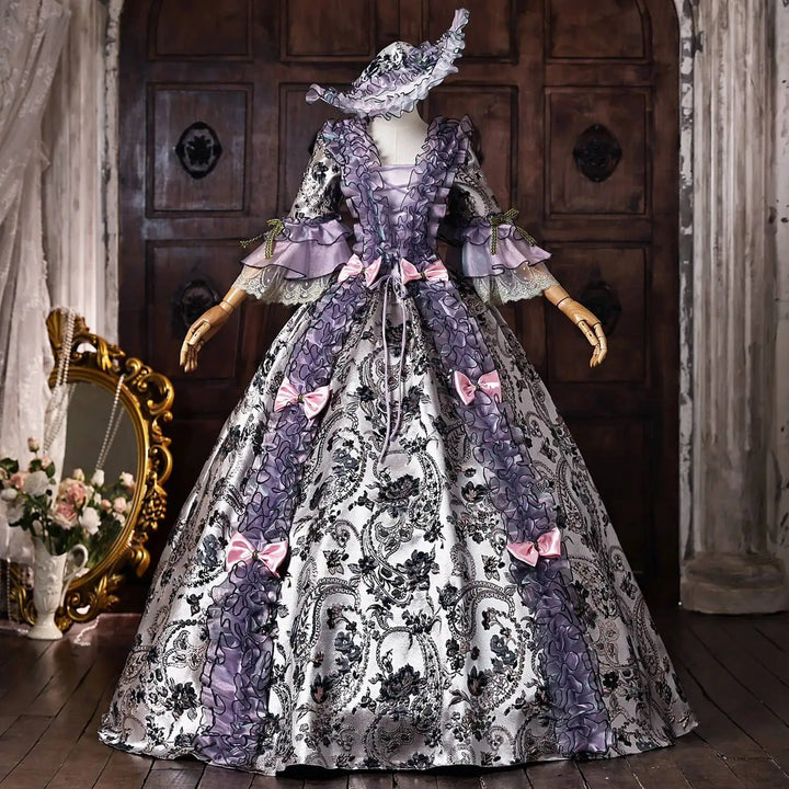 Full view of purple lace cosplay dress with layered ruffles and black-and-white printed skirt