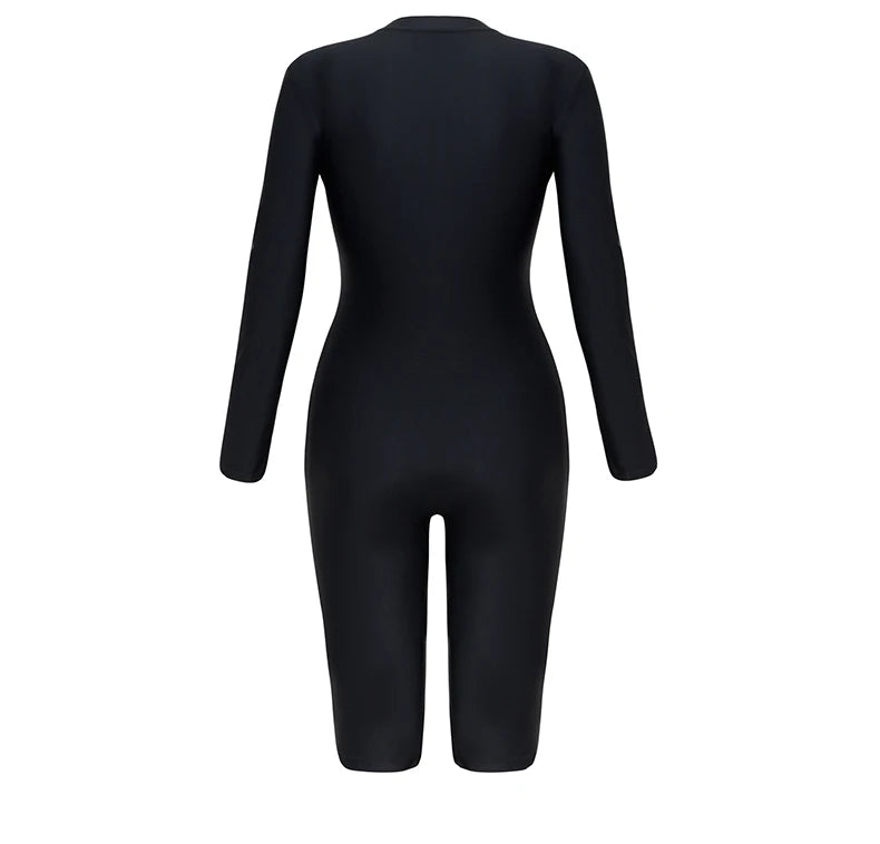 Women’s one-piece swimwear back view, black long sleeves and knee-length legs