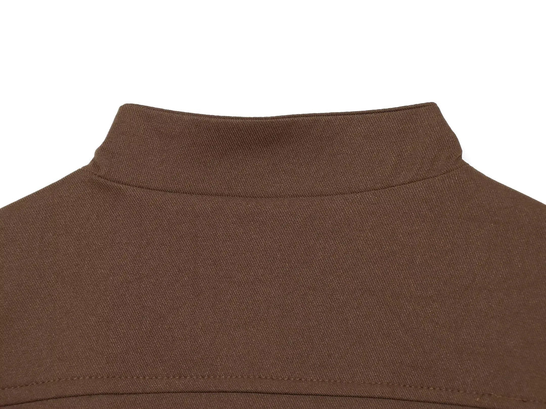 Brown high-neck collar on a cropped blazer with clean top edge stitching