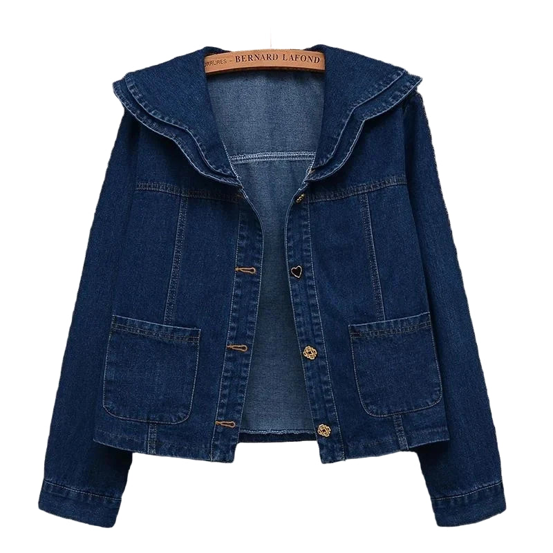 Blue denim jacket on a gray background