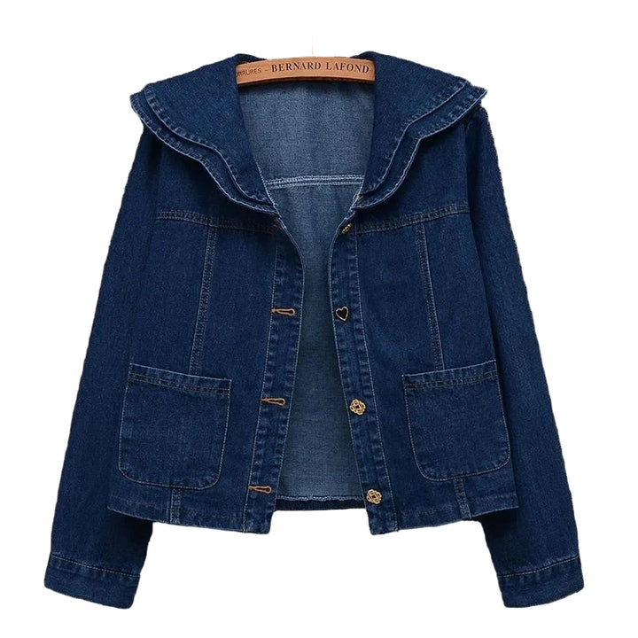 Blue denim jacket on a gray background