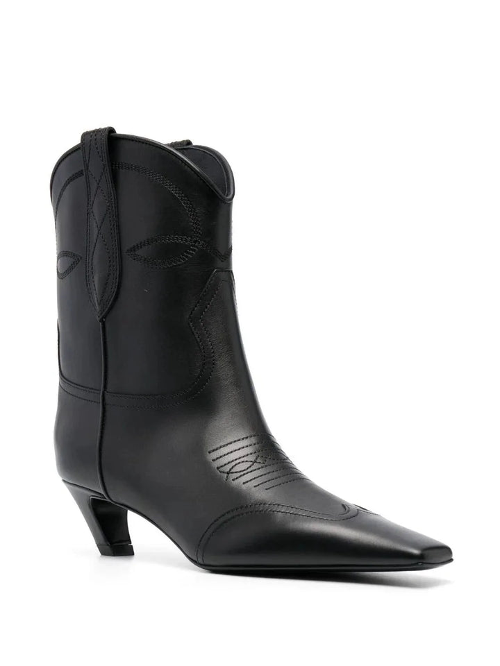 Black leather-look cowboy boot with pointed toe, stitched panels, and low heel