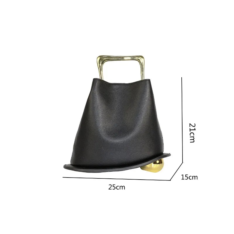 Black leather bucket crossbody bag with gold-tone top handle and structured base
