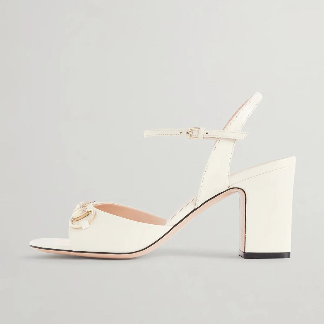 Beige women's chunky-heel slingback sandals with ankle strap and bow detail