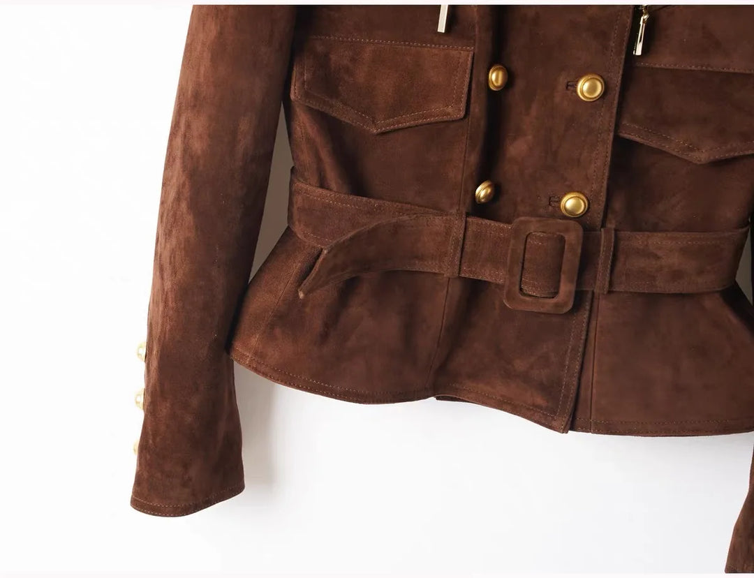 Brown suede jacket front with gold buttons, patch pockets, and belt buckle