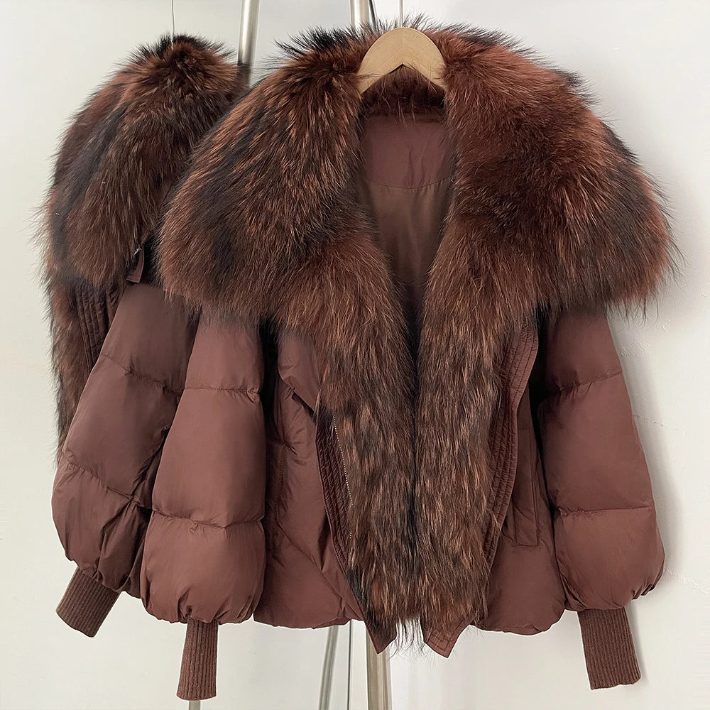 Dark brown puffer coat with long faux-fur hood trim and ribbed knit cuffs