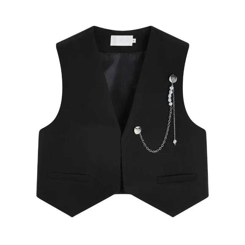 Black tailored women’s waistcoat with notched lapels and silver-tone chain detail