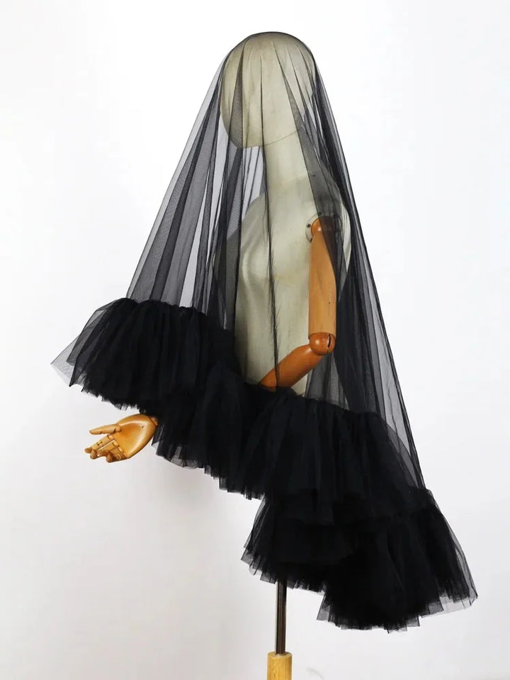 Black tulle bridal veil with ruffled edge and layered sheer tiers