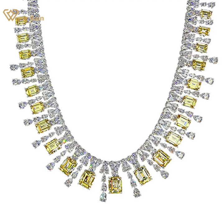 A luxury emerald cut women's necklace with yellow and white gemstones, designed for formal events or as a statement piece.